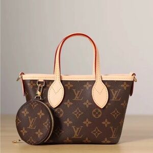 Louis Vuitton Neverfull Bb with beige strap